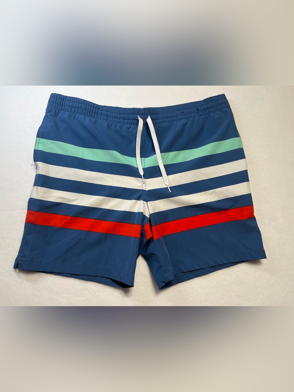 chubbies Navy Swim Trunks with Red, White & Mint Stripes